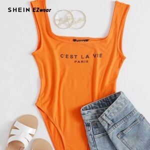 SHEIN Orange Scoop Neck Graphic Bodysuit.  I accidently ordered 2. Never worn